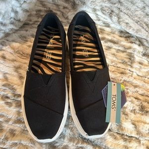 Toms black slip on shoes